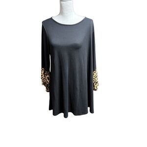 Beeson River dress with Leopard Print Sleeves maybe a medium?  No size tag